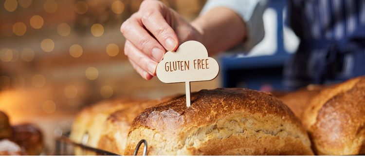Blog of Should Everyone Avoid Gluten? Understanding the Science which have image A hand places a wooden 