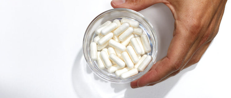 Blog of Top 10 Benefits of Butyrate for Gut & Body Health which have image hand holding butyrate supplements
