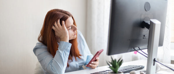 woman dejected at computer