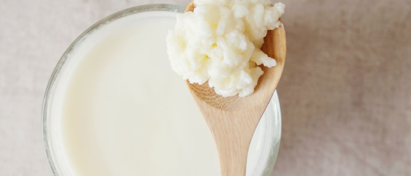 kefir on a wooden spoon