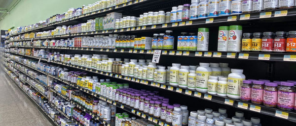 grocery store shelves of vitamins